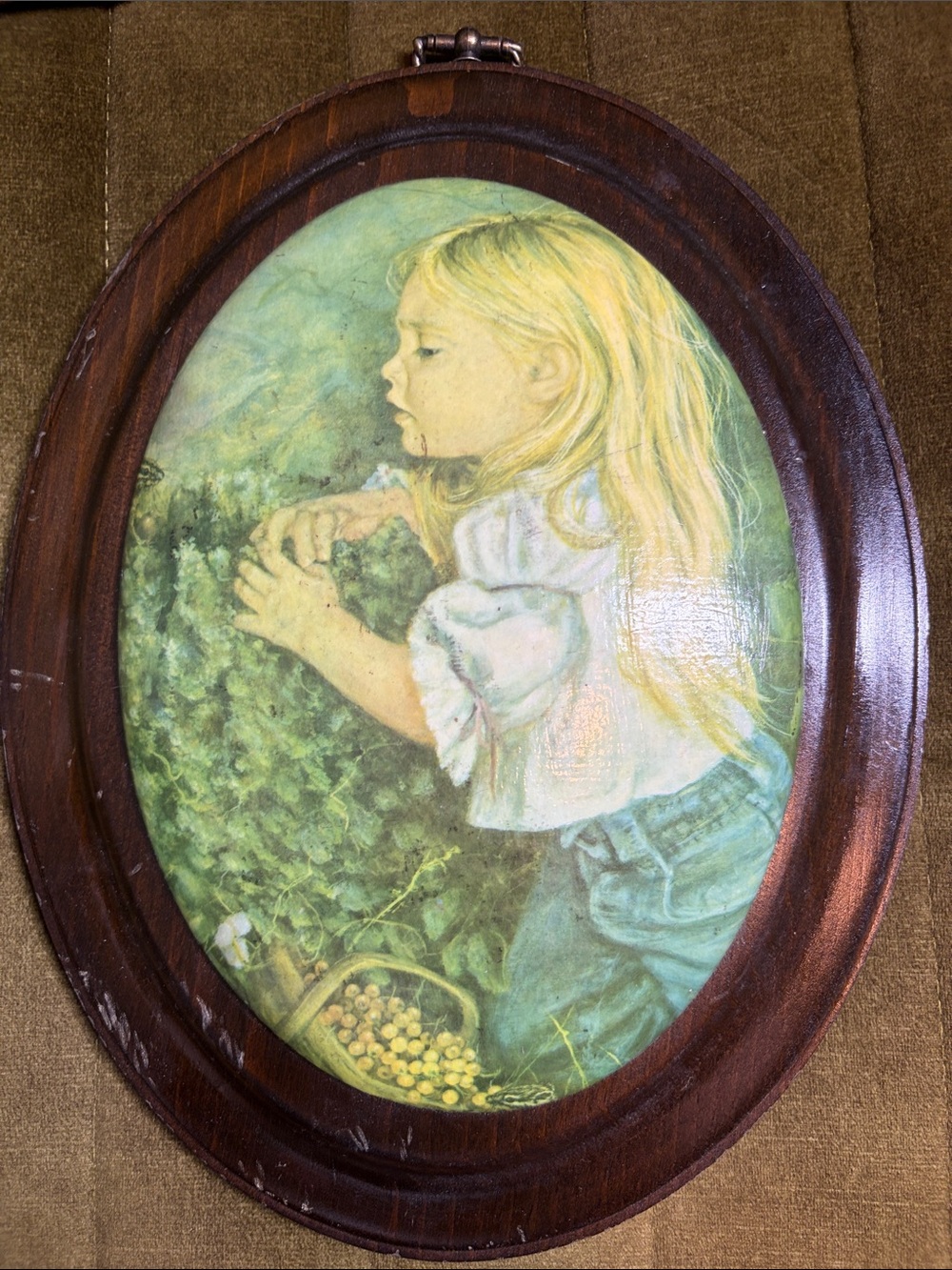 Vintage convex wooden plaque art of little blonde girl picking grapes